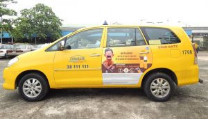 Quảng cáo trên taxi Vinataxi